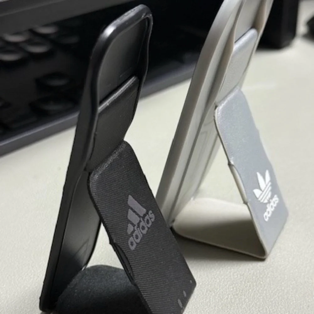 Adidas Universal Stand and Grip Works with Most any Mobile Phone Removable Black